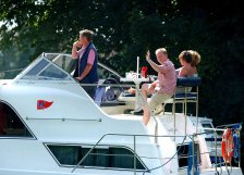 Family on a hire boat on the River Thames